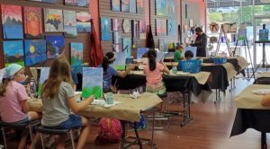 Kids summer art camp painting at Cheers N Paint in cary, nc.