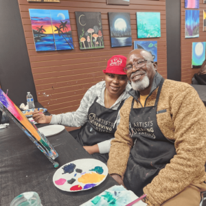 adult couple at paint and sip class in Cary, NC