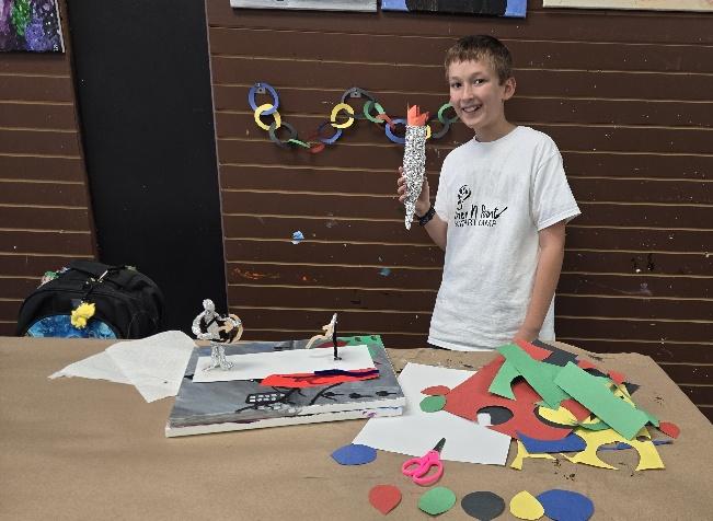 student art craft making an olympic torch for summer art camp