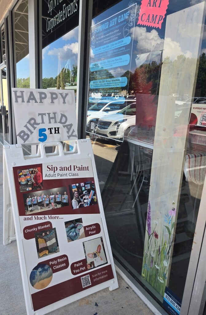 Cheers N Paint Art Studio sign that reads happy 5th birthday 