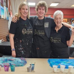 Mother And Daughters At Cheers N Paint Art Studio During Art Class.