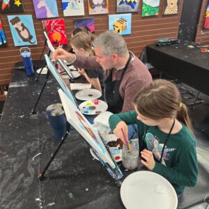 Family Painting Together At Cheers N Paint Art Studio