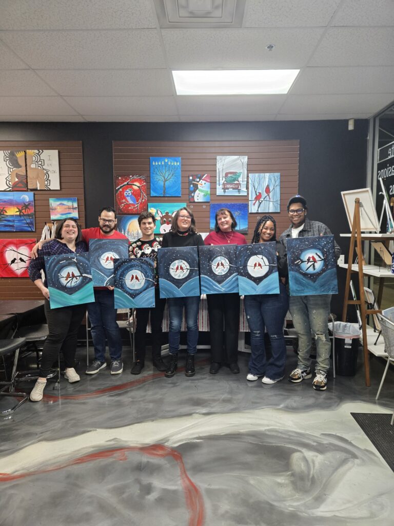 family at locally owned paint studio, cheers n paint in Cary NC 