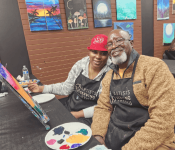 adult couple at paint and sip class in Cary, NC